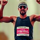 Athlete David Grant posing after a race.