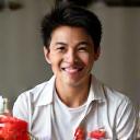 Kevin Wong holding a healthy smoothie.